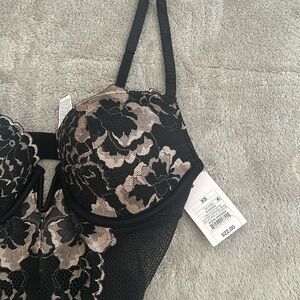 Brand new with tags. Super sexy one piece body suit/ lingerie.